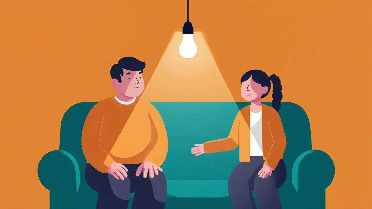 Rodič a dítě sedí vedle sebe na kanapě, nekoukají na sebe, mezi nimi prázdný prostor.